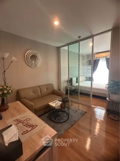 Modern living room with cozy decor and bedroom view in stylish apartment