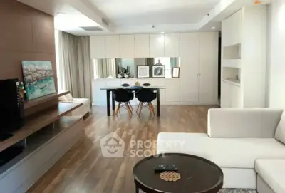 Spacious modern living room with elegant dining area and stylish decor