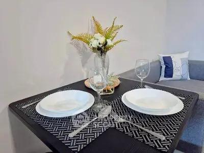 Elegant dining setup with modern decor in a cozy living space