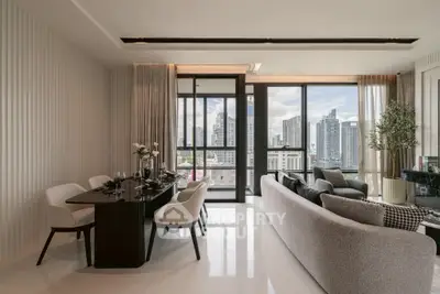 Luxurious modern living room with city view, elegant dining area, and floor-to-ceiling windows.