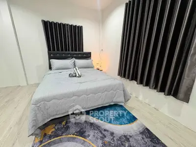 Modern bedroom with stylish decor and cozy ambiance