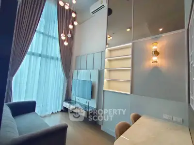 Modern living room with high ceiling and stylish lighting in luxury apartment