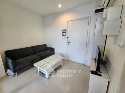 Modern living room with sleek furniture and minimalist design, perfect for urban living.