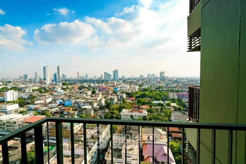 Stunning cityscape view from a high-rise balcony, perfect for urban living enthusiasts.