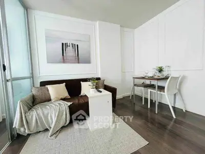 Modern living room with cozy sofa and dining area in stylish apartment