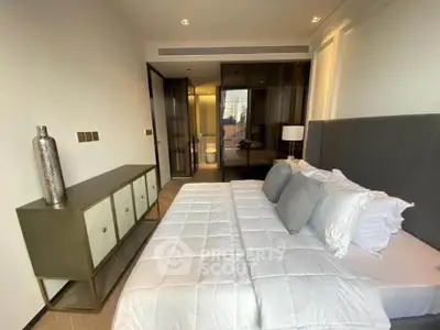 Luxurious bedroom with modern decor and elegant furnishings in a high-end apartment.