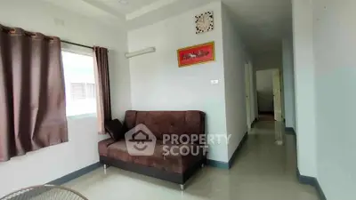 Cozy living room with modern sofa and wall art in a bright apartment