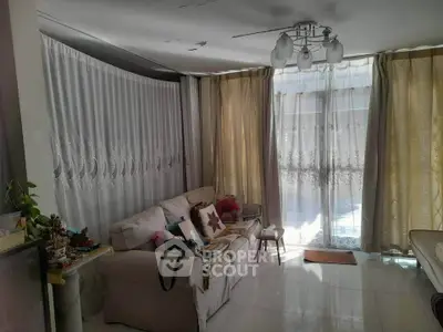 Cozy living room with elegant curtains and comfortable seating