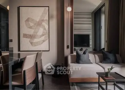 Stylish modern living room with elegant decor and cozy seating area.