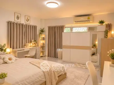 Cozy and elegant bedroom with modern decor and ample natural light.