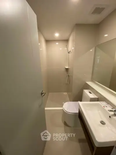 Modern bathroom with sleek design and spacious shower area