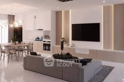 Modern open-plan living room with sleek kitchen and stylish decor