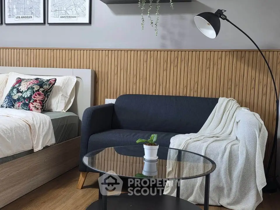 Cozy bedroom with stylish decor and comfortable seating area