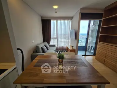 Modern living room with balcony view in stylish apartment