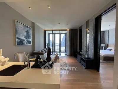 Luxurious open-plan living room with modern kitchen and stunning city view