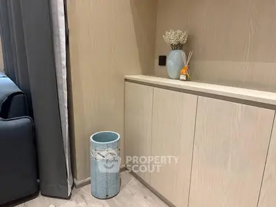 Modern living room corner with stylish cabinet and decorative vase