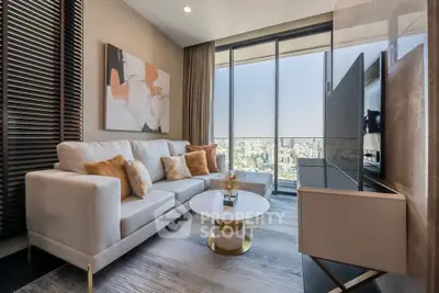 Luxurious living room with modern decor and stunning city view