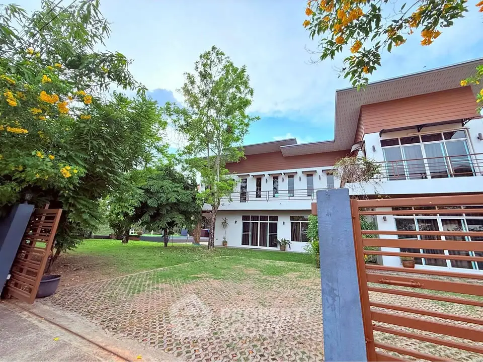 Spacious modern home with lush garden and large windows