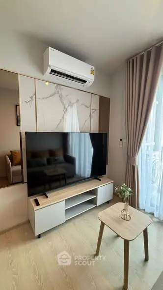 Modern living room with sleek TV setup and elegant decor