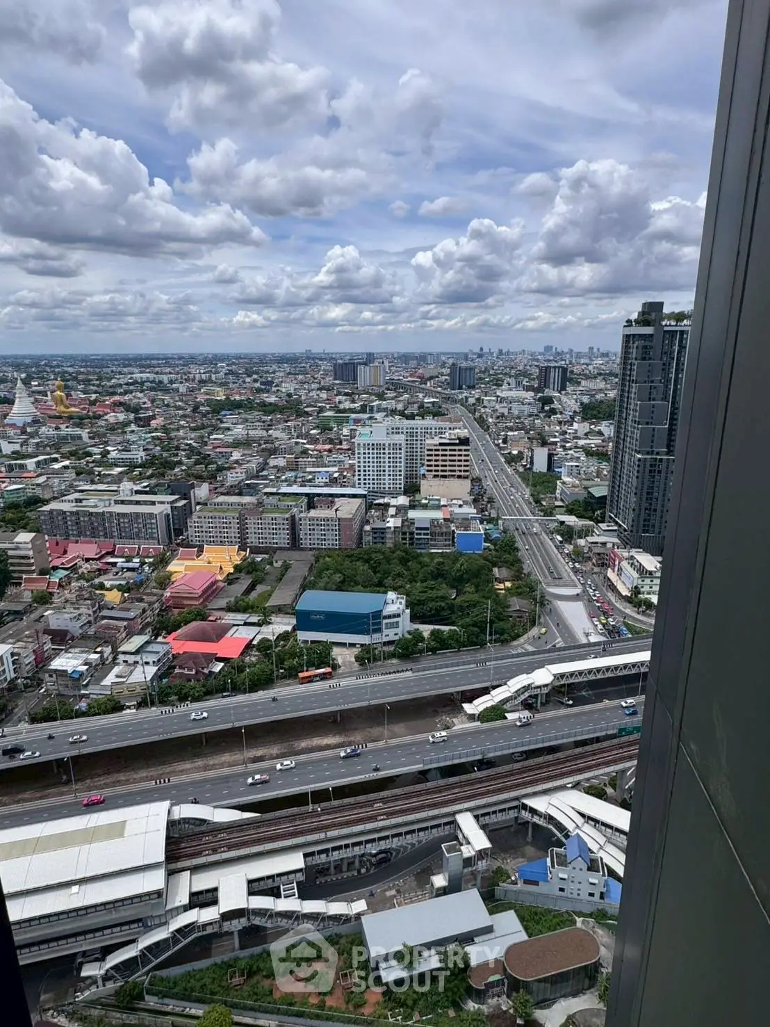 Stunning cityscape view from high-rise building showcasing urban landscape and skyline.
