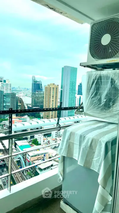 Stunning high-rise balcony view with cityscape and modern architecture.