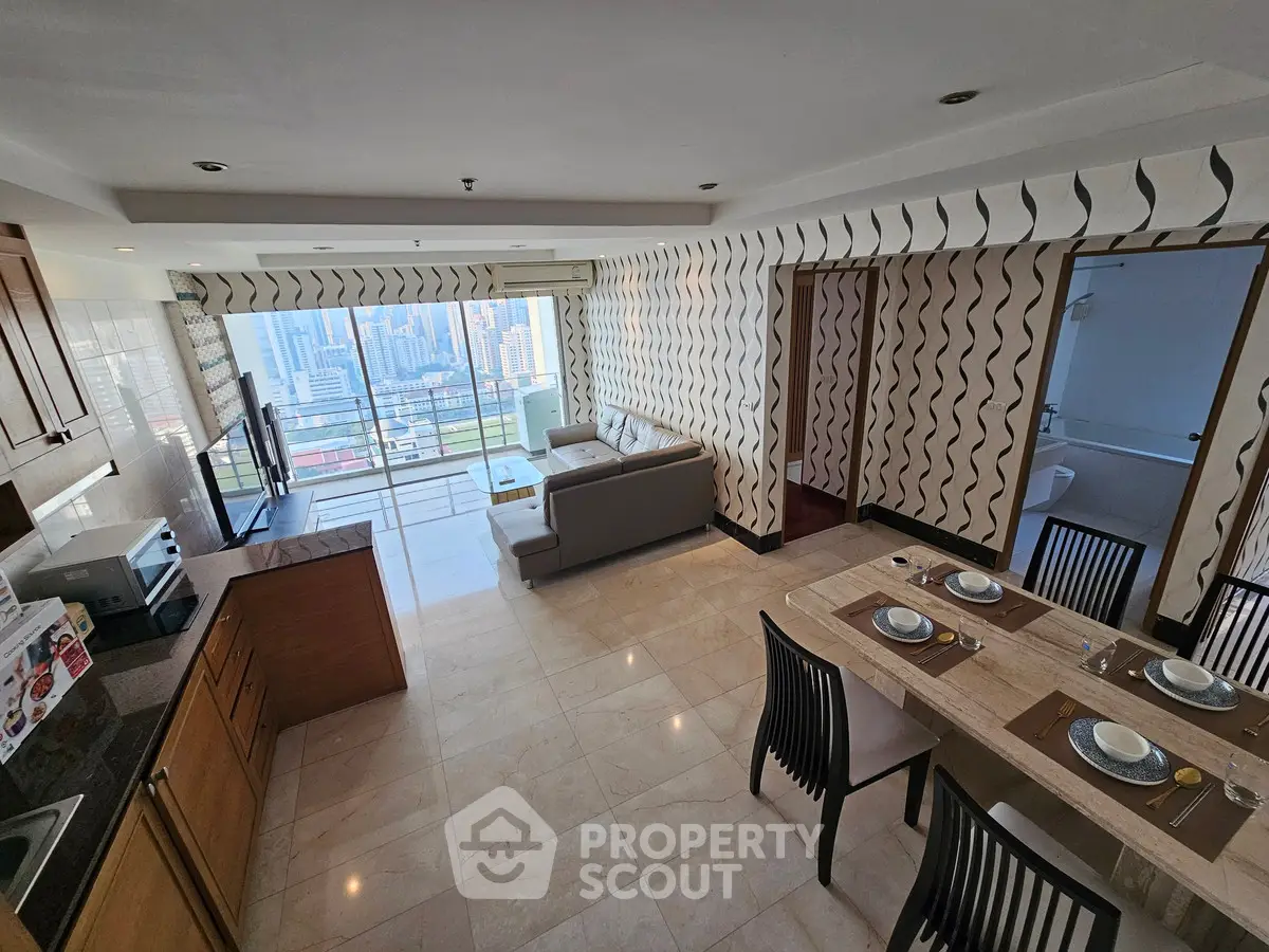 Spacious modern living room with city view and open kitchen layout