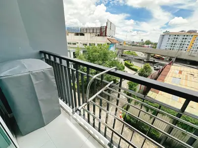 Modern balcony with city view and sleek railing design
