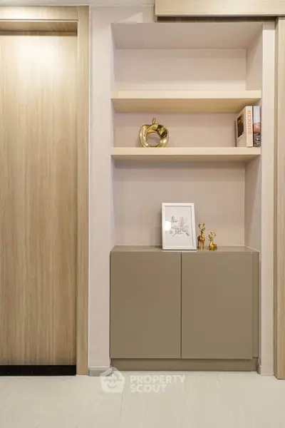 Modern interior with stylish shelving and elegant decor in a contemporary living space.
