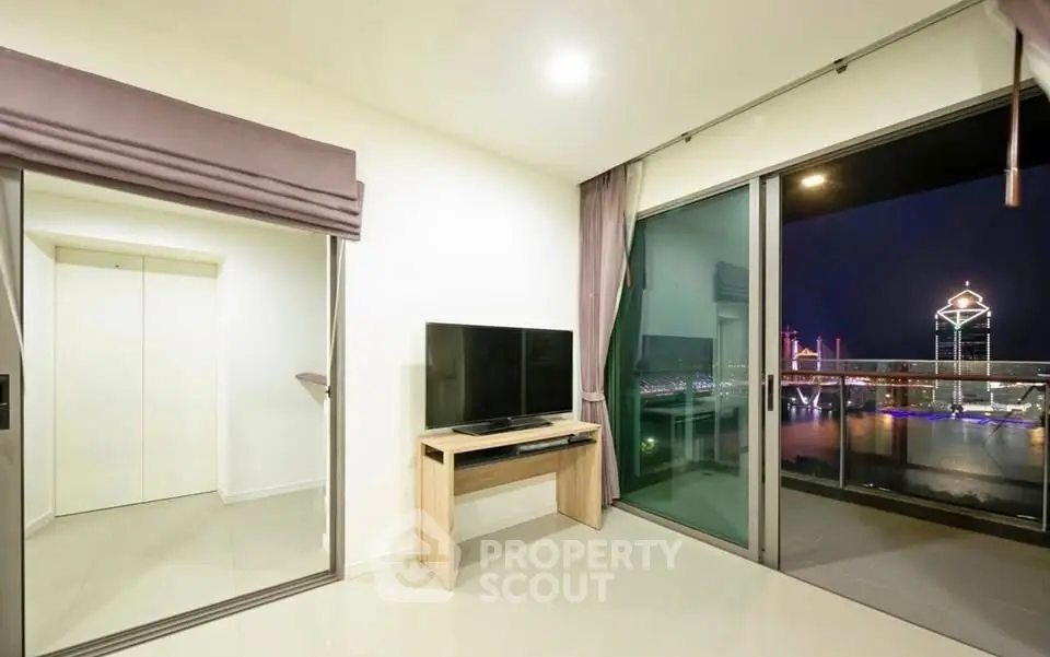 Modern living room with city view and balcony access