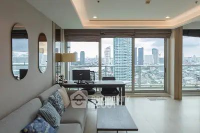 Luxurious living room with stunning city view and modern decor in high-rise apartment.