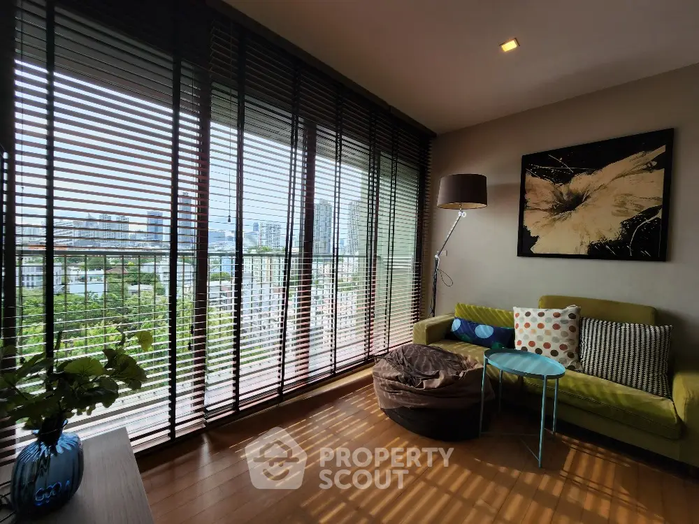 Stylish living room with floor-to-ceiling windows and modern decor