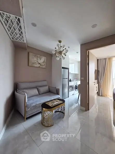 Modern living room with elegant decor and open kitchen view