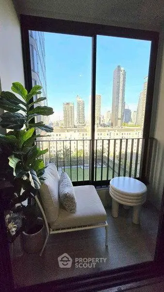 Chic balcony with stunning city view, perfect for relaxation and enjoying urban skyline.