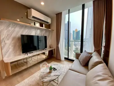Luxurious living room with modern decor and stunning city view from large windows.