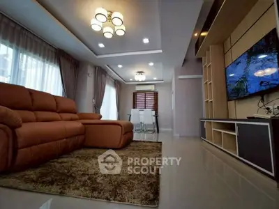 Spacious modern living room with plush sofa and elegant lighting