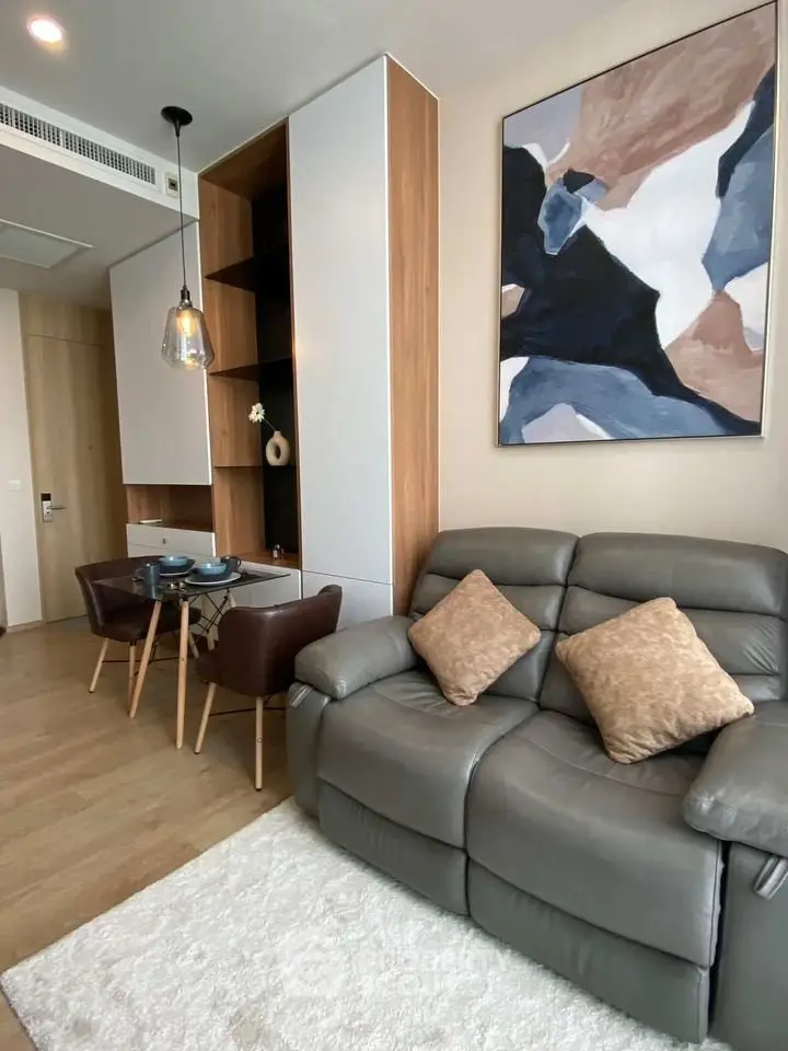 Modern living room with stylish decor and comfortable seating in a contemporary apartment.