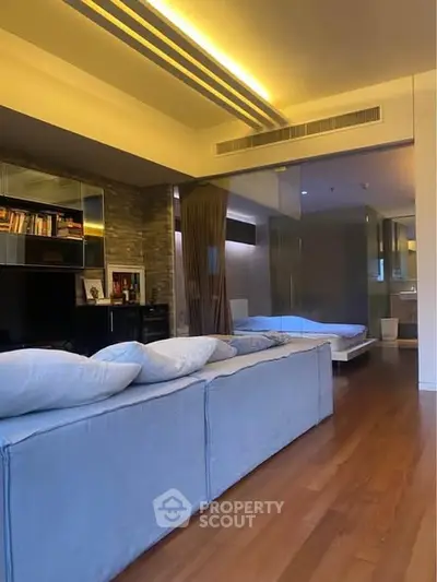 Modern living room with cozy sofa and stylish decor