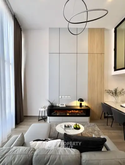 Modern living room with stylish fireplace and elegant decor