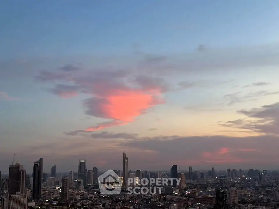 Stunning city skyline view at sunset with vibrant clouds