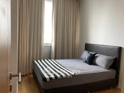 Cozy bedroom with modern decor and natural light