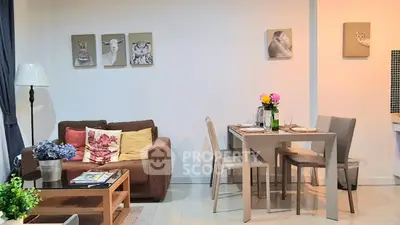 Charming living room with cozy sofa and elegant dining area, perfect for modern living.