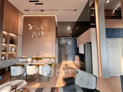 Luxurious modern living room with elegant dining area and stylish lighting in a contemporary apartment.