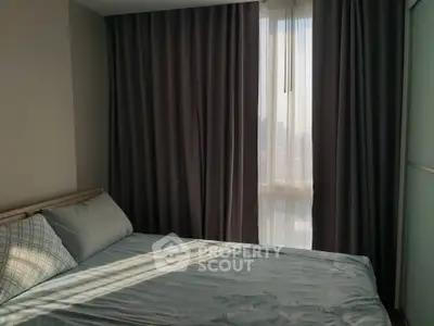 Cozy bedroom with soft lighting and elegant curtains