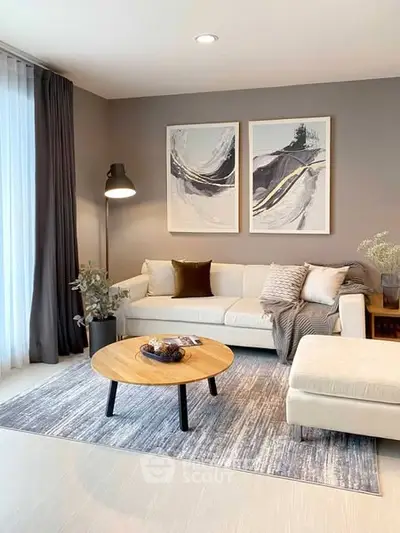 Modern living room with stylish decor and cozy seating area