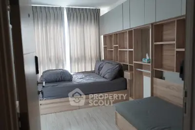 Modern bedroom with sleek wooden furniture and natural light