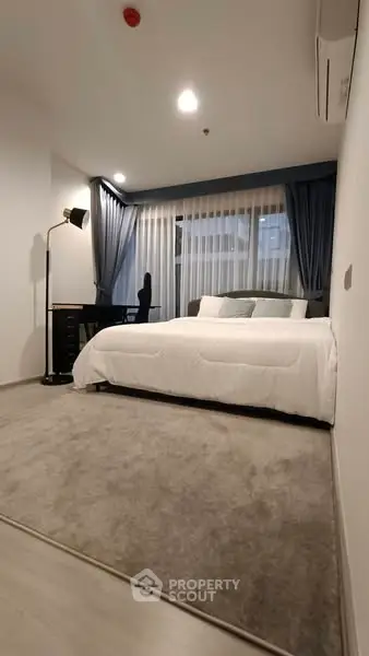 Modern bedroom with cozy lighting and stylish decor