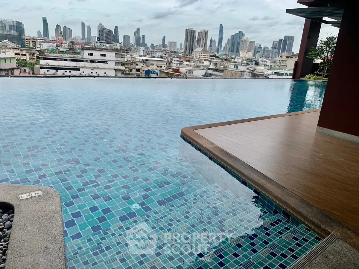 Stunning rooftop pool with panoramic city skyline view
