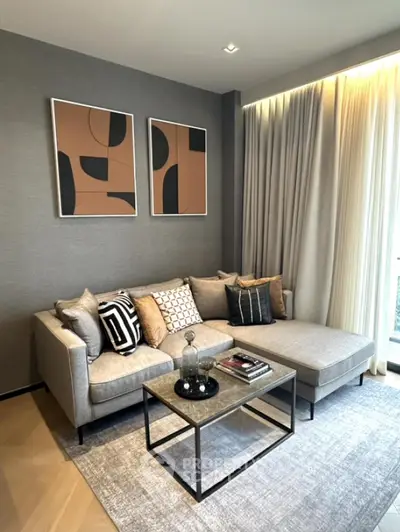 Stylish modern living room with cozy sectional sofa and abstract art decor