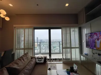 Spacious living room with stunning city view and modern decor