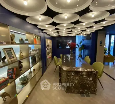 Modern living room with unique ceiling design and elegant decor